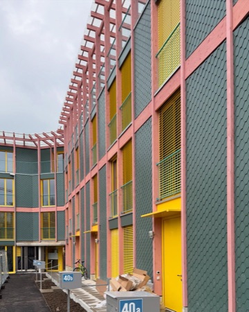 Fassaden, Höfe aus Holz, Metall · Siedlung Buchwiesen — BS+EMI Architektenpartner