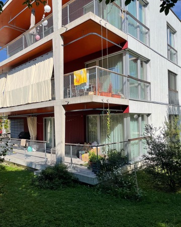 Fassaden, Balkone aus Beton, Holz · Wohnsiedlung Brüggliäcker — BS+EMI Architektenpartner