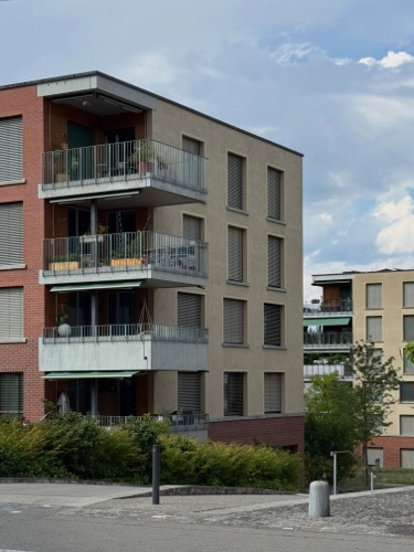 Fassaden, Balkone aus Backstein, Verputz · Wohnsiedlung Im Stückler — Adrian Streich Architekten
