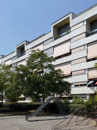 Fassaden aus Verputz · Überbauung James — SGGK Architekt*innen Studio Gmür
