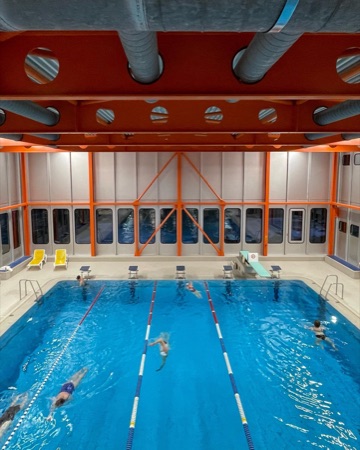 Fenster, Stützen aus Metall, Glas · Hallenbad und Turnhalle Bläsi — Adolf Wasserfallen