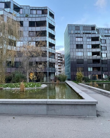 Fassaden, Höfe aus Beton, Metall · Wohnüberbauung Guggach — BS+EMI Architektenpartner