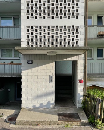 Fassaden, Türen aus Beton, Backstein · Greifenseestrasse 60