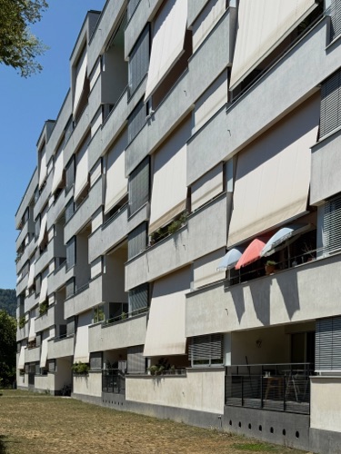 Fassaden, Balkone aus Verputz · Überbauung James — SGGK Architekt*innen Studio Gmür