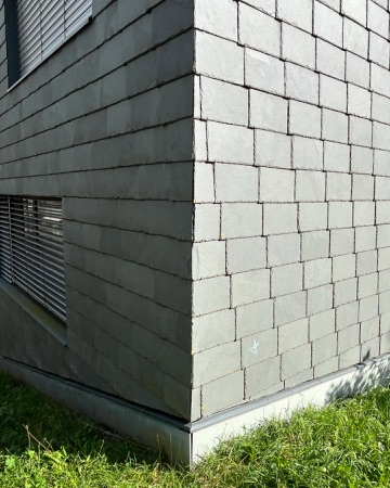 Fassaden aus Naturstein · Wohnsiedlung Leimbachstrasse — pool Architekten