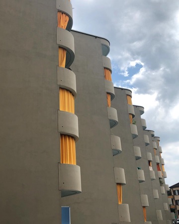 Fassaden, Balkone aus Beton, Verputz · Wohnsiedlung Heuried — Peter Leemann / Claude Paillard