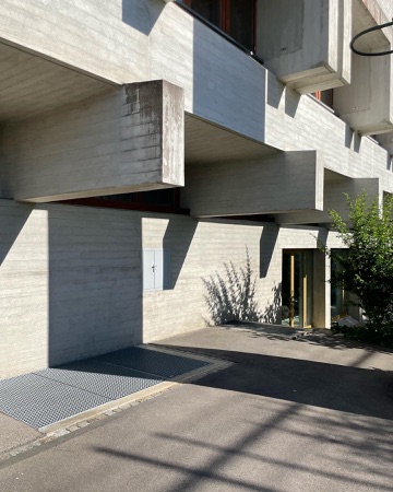 Fassaden, Türen aus Beton, Metall · Schulhaus Stettbach — Esther & Rudolf Guyer