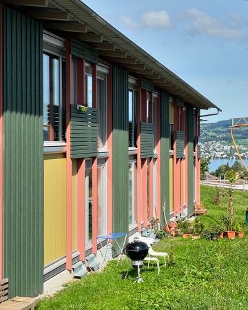 Fassaden, Fenster aus Holz, Metall · Wohnsiedlung Kuppe, Quartier Trift — Esch Sintzel Architekten