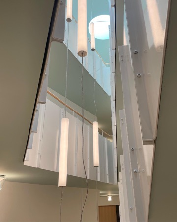 Treppenhäuser, Handläufe aus Holz, Metall · Alterssiedlung Talstrasse — Baumberger Stegmeier Architektur
