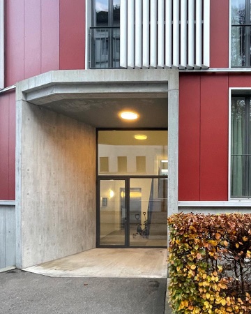 Fassaden, Türen aus Beton, Metall · Wohnsiedlung Guggach — Althammer Hochuli Architekten