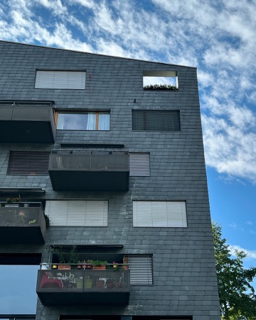 Fassaden, Fenster aus Metall, Naturstein · Wohnsiedlung Leimbachstrasse — pool Architekten
