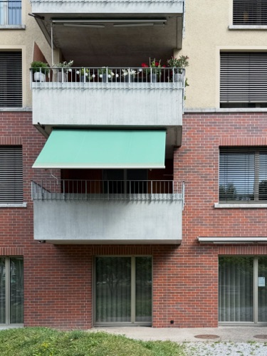 Fassaden, Balkone aus Beton, Backstein · Wohnsiedlung Im Stückler — Adrian Streich Architekten