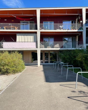 Fassaden, Balkone aus Beton, Holz · Wohnsiedlung Brüggliäcker — BS+EMI Architektenpartner