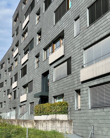 Fassaden, Fenster aus Metall, Naturstein · Wohnsiedlung Leimbachstrasse — pool Architekten