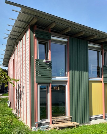Fassaden, Fenster aus Holz, Metall · Wohnsiedlung Kuppe, Quartier Trift — Esch Sintzel Architekten