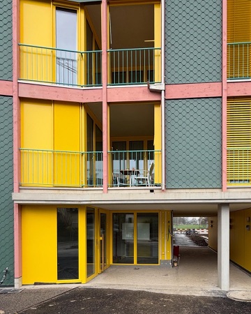 Fassaden, Balkone aus Holz, Glas · Siedlung Buchwiesen — BS+EMI Architektenpartner