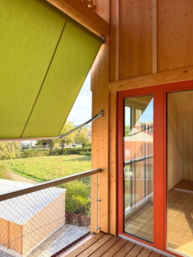 Balkone aus Holz · Wohnüberbauung Hofwisen — Baumberger Stegmeier Architektur
