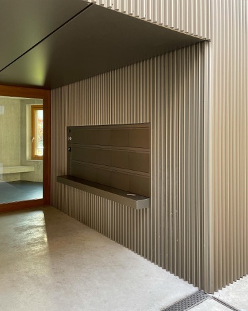 Türen, Eingänge aus Holz, Metall · Wohnsiedlung Riedgraben — Blättler Dafflon Architekten