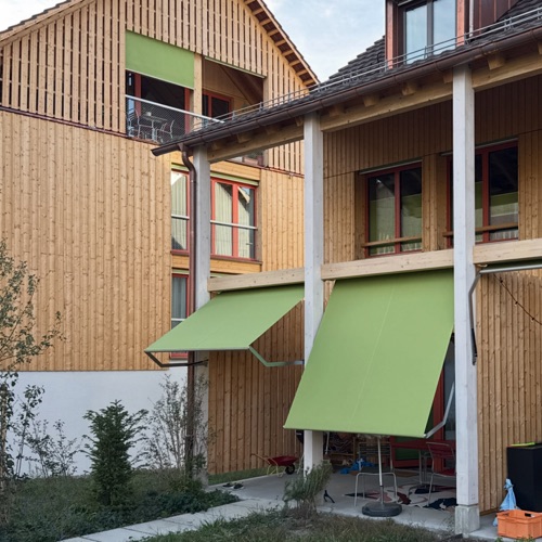 Fassaden aus Holz · Wohnüberbauung Hofwisen — Baumberger Stegmeier Architektur
