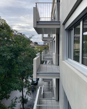 Fassaden, Handläufe aus Beton, Metall · Ersatzneubau Hunzikerei - Wohnen im Gewerbehaus — op-arch