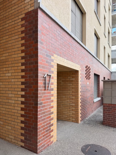 Fassaden, Eingänge aus Backstein · Wohnsiedlung Im Stückler — Adrian Streich Architekten
