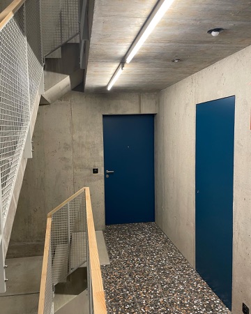 Treppenhäuser, Türen aus Beton, Metall · Wohnsiedlung Birchstrasse — Enzmann Fischer Partner