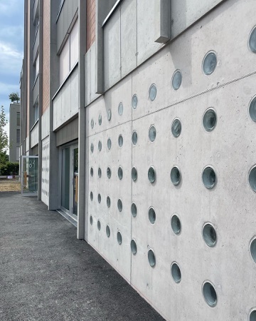Fassaden, Eingänge aus Beton, Metall · Wohnsiedlung Birchstrasse — Enzmann Fischer Partner
