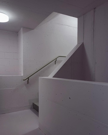 Treppenhäuser, Handläufe aus Beton, Metall · Wohnüberbauung Wydäckerring — Duplex Architekten