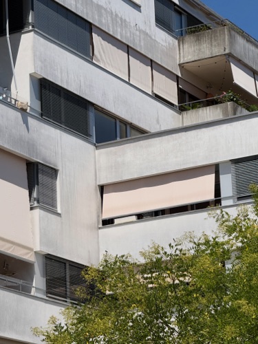 Fassaden aus Verputz · Überbauung James — SGGK Architekt*innen Studio Gmür